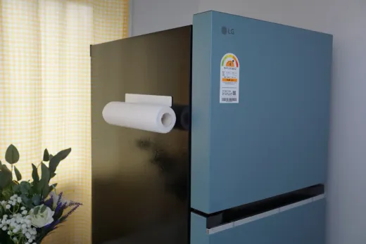 A refrigerator installed in a coliving house kitchen